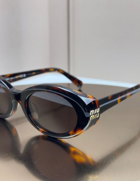 Сонцезахисні окуляри Miu Miu SMU B09 черепахові овальні ацетат жіночі