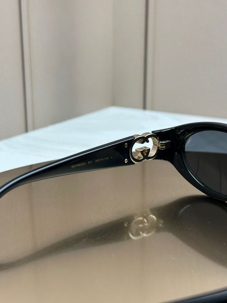 Сонцезахисні окуляри Gucci GG1662SA чорні овальні, логотип GG, темна лінза, жіночі, оригінал GUC92288 фото