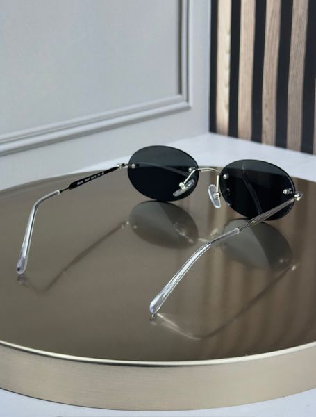 Солнцезащитные очки Ray-Ban RB3767 серебро, темная линза, безободковые, овальные, унисекс