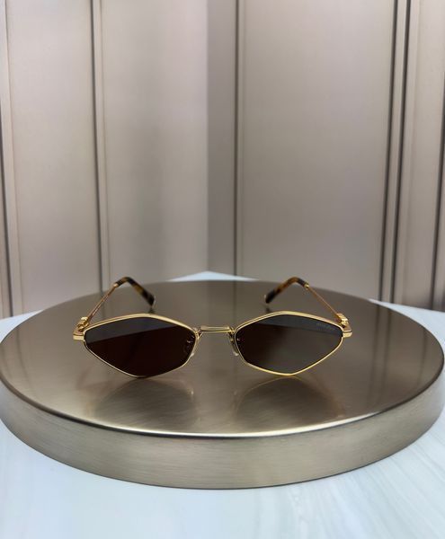 Сонцезахисні окуляри Miu Miu SMU 56ZS золоті ромбоподібні металеві жіночі