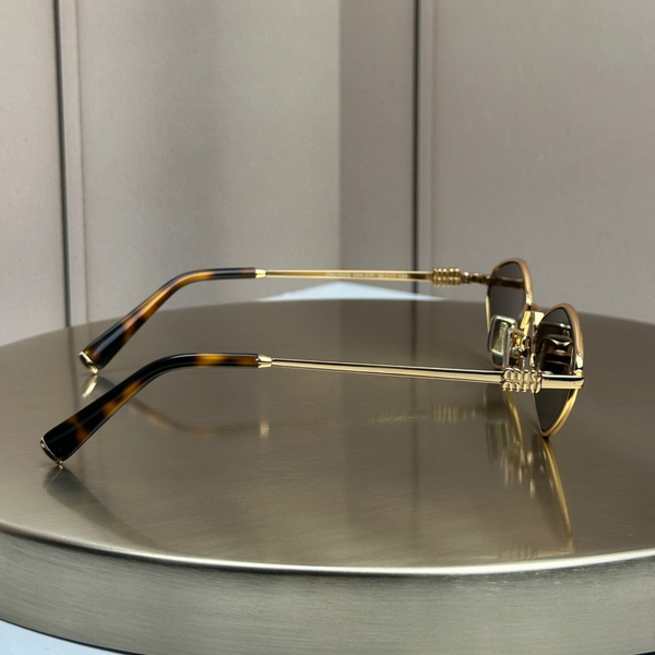 Сонцезахисні окуляри Miu Miu SMU 56ZS Gold Havana/Brown