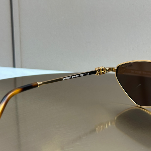 Сонцезахисні окуляри Miu Miu SMU 56ZS Gold Havana/Brown