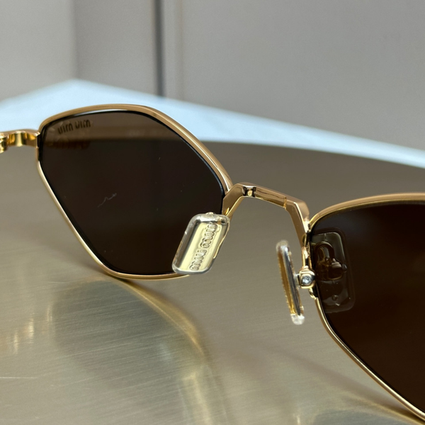 Сонцезахисні окуляри Miu Miu SMU 56ZS Gold Havana/Brown