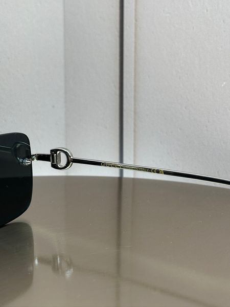 Сонцезахисні окуляри Gucci GG1703S срібні безоправні прямокутні унісекс